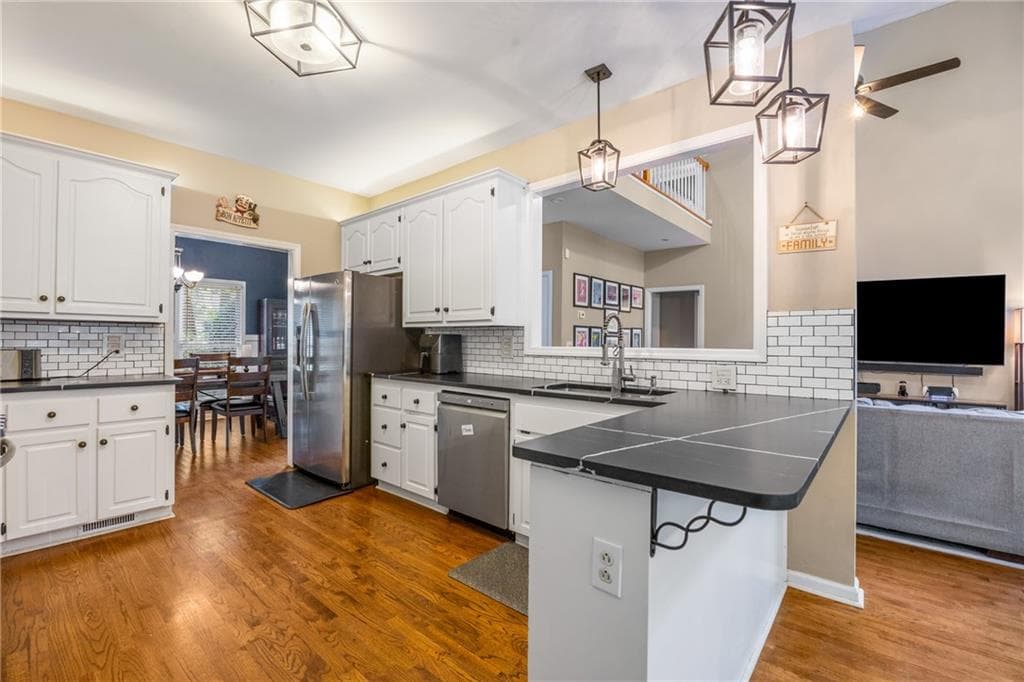 5 bedroom, 3 bathroom, 4,146 sq ft single family residence for sale at 2420 Bexford View, Cumming, GA 30041 — photo 9