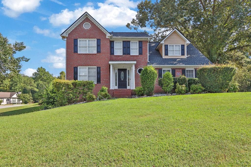 5 bedroom, 4 bathroom, 3,140 sq ft single family residence for sale at 1892 Rockbrook Court, Snellville, GA 30078 — photo 1 of 43