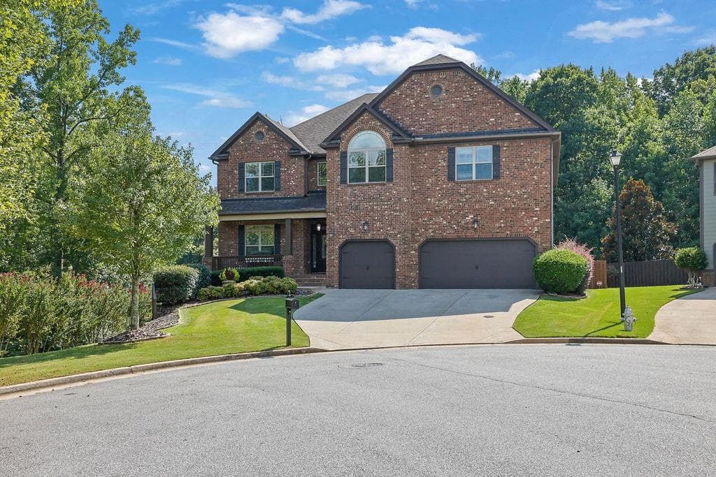 5 bedroom, 5 bathroom, 6,721 sq ft single family residence for sale at 1740 Wildflower Court, Cumming, GA 30041
