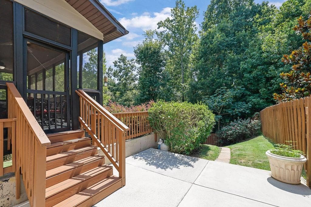 5 bedroom, 5 bathroom, 6,721 sq ft single family residence for sale at 1740 Wildflower Court, Cumming, GA 30041 — photo 2