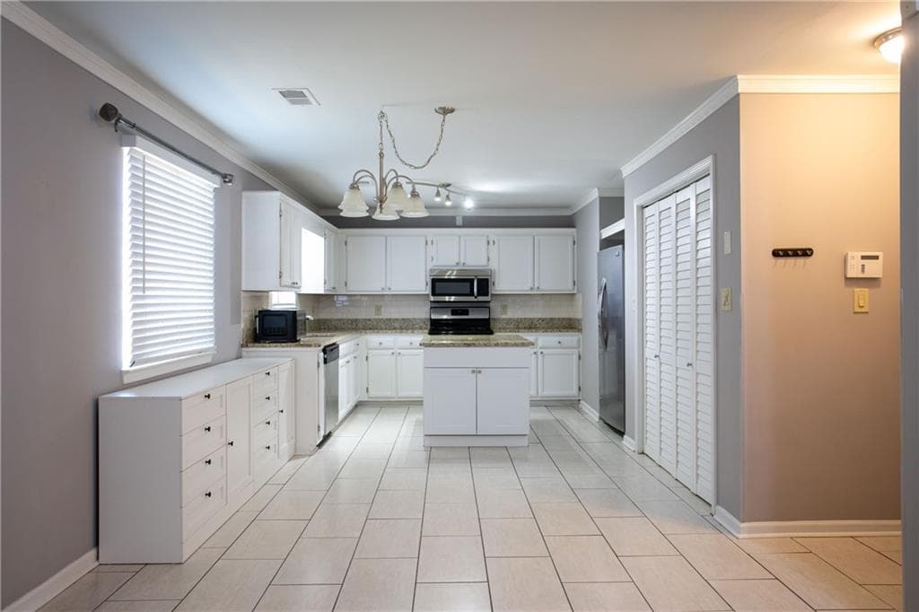 3 bedroom, 2 bathroom, 1,315 sq ft single family residence under contract at 7216 New Dale Road, Rex, GA 30273 — photo 5