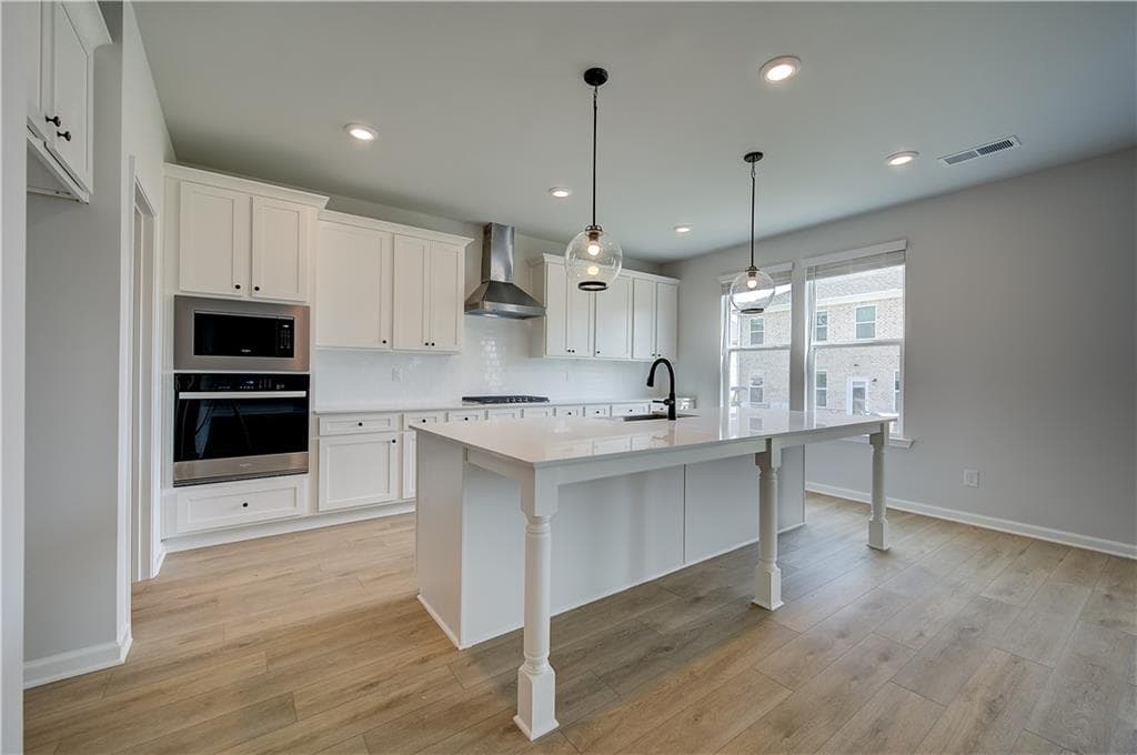 4 bedroom, 3 bathroom, 2,527 sq ft single family residence for sale at 179 Dalston Cove, Stockbridge, GA 30281 — photo 6