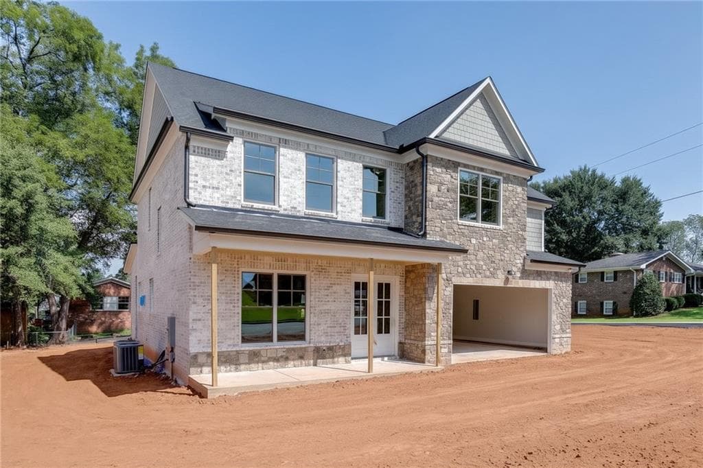 4 bedroom, 4 bathroom, 3,150 sq ft single family residence for sale at 9 Stonehedge Drive, Buford, GA 30518 — photo 2
