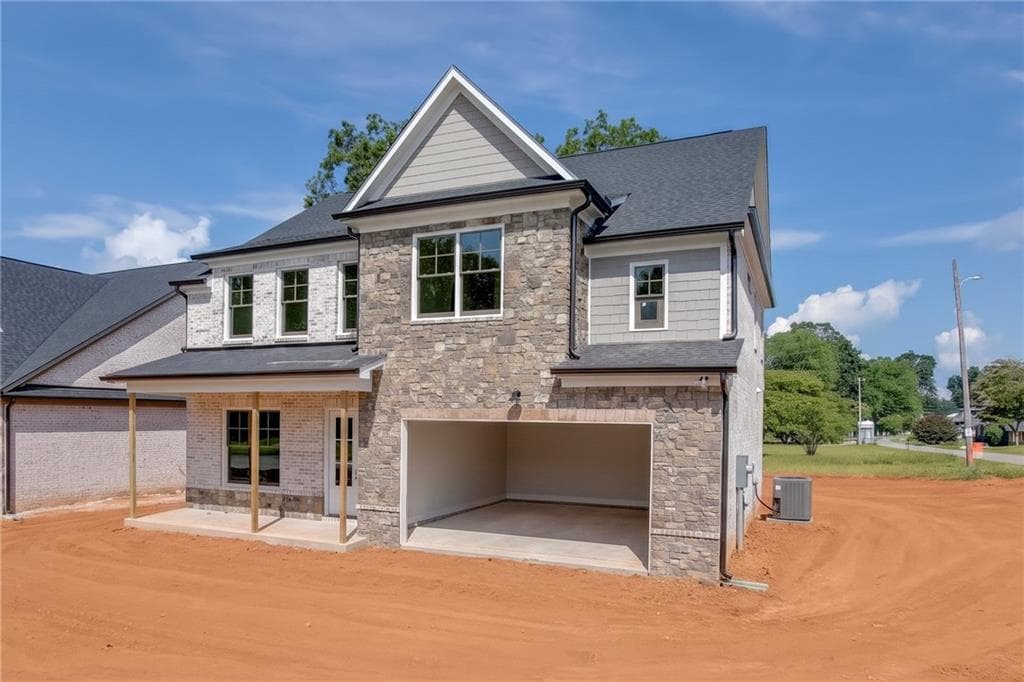 4 bedroom, 4 bathroom, 3,150 sq ft single family residence for sale at 9 Stonehedge Drive, Buford, GA 30518 — photo 3