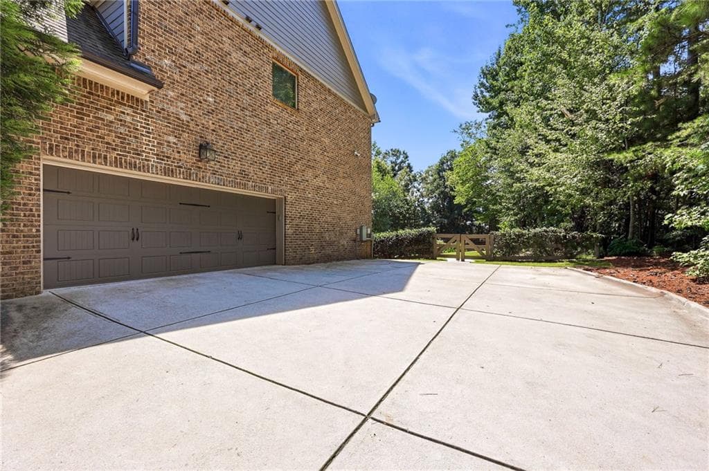 5 bedroom, 6 bathroom, 5,100 sq ft single family residence for sale at 5296 Frazer Road, Buford, GA 30518 — photo 8