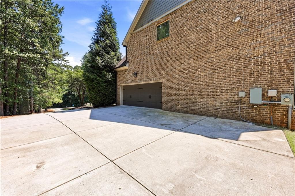 5 bedroom, 6 bathroom, 5,100 sq ft single family residence for sale at 5296 Frazer Road, Buford, GA 30518 — photo 9