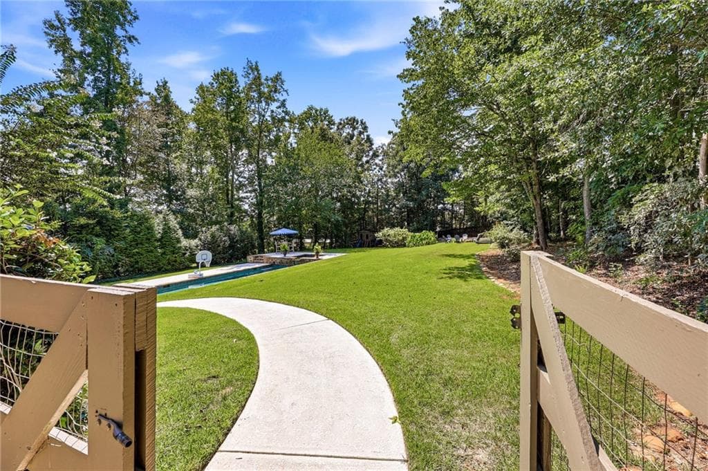 5 bedroom, 6 bathroom, 5,100 sq ft single family residence for sale at 5296 Frazer Road, Buford, GA 30518 — photo 10