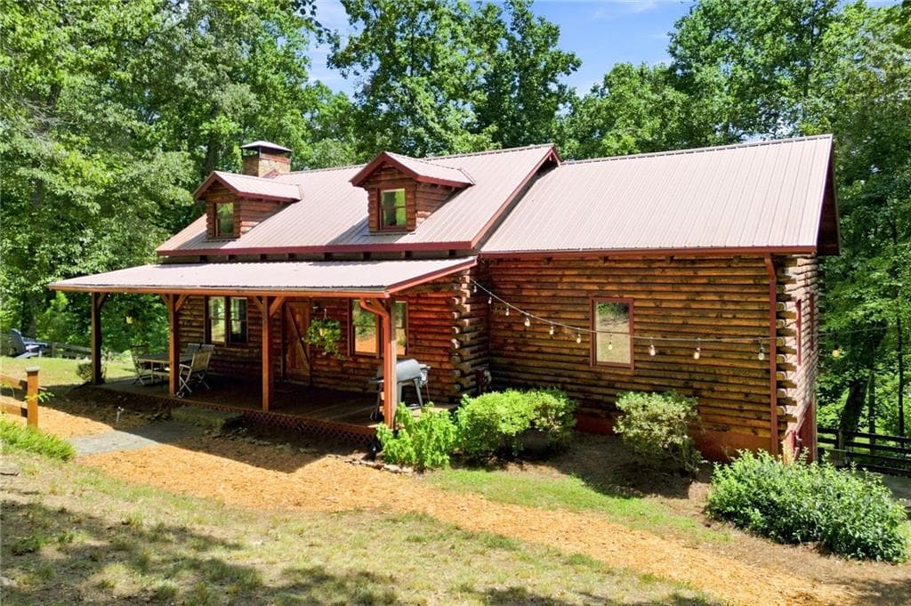 4 bedroom, 3 bathroom, 3,524 sq ft single family residence for sale at 400 Foster Coltrane Lane, Ball Ground, GA 30107 — photo 2