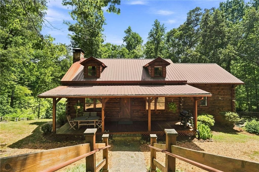 4 bedroom, 3 bathroom, 3,524 sq ft single family residence for sale at 400 Foster Coltrane Lane, Ball Ground, GA 30107 — photo 4