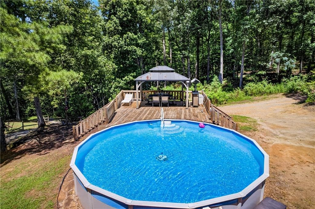 3 bedroom, 2 bathroom, 1,400 sq ft single family residence for sale at 110 Hickory Hills Road, Ellijay, GA 30540 — photo 5