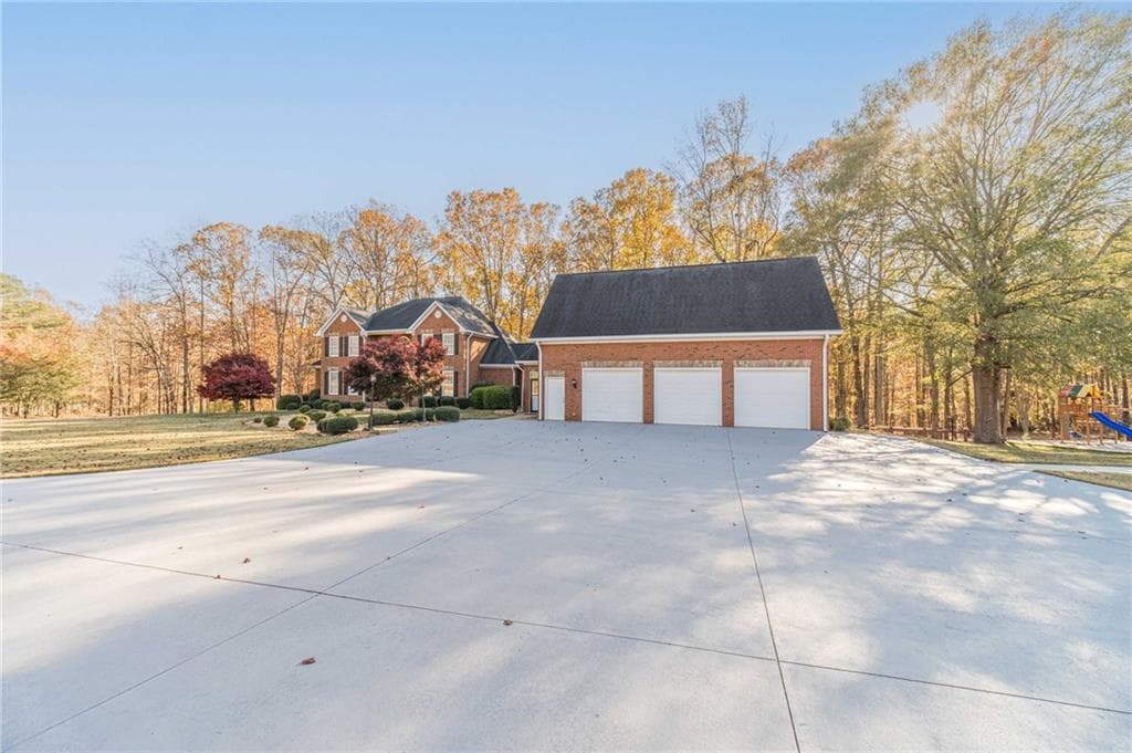 5 bedroom, 6 bathroom, 10,335 sq ft single family residence for sale at 686A Newton Factory Bridge, Covington, GA 30014 — photo 2