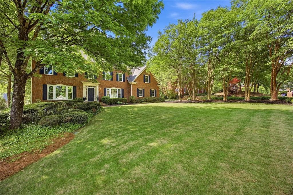 5 bedroom, 5 bathroom, 4,879 sq ft single family residence for sale at 7525 S Spalding Lake Drive, Atlanta, GA 30350 — photo 2