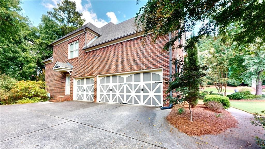 6 bedroom, 5 bathroom, 4,692 sq ft single family residence for sale at 3755 Maryhill Lane, Kennesaw, GA 30152 — photo 2