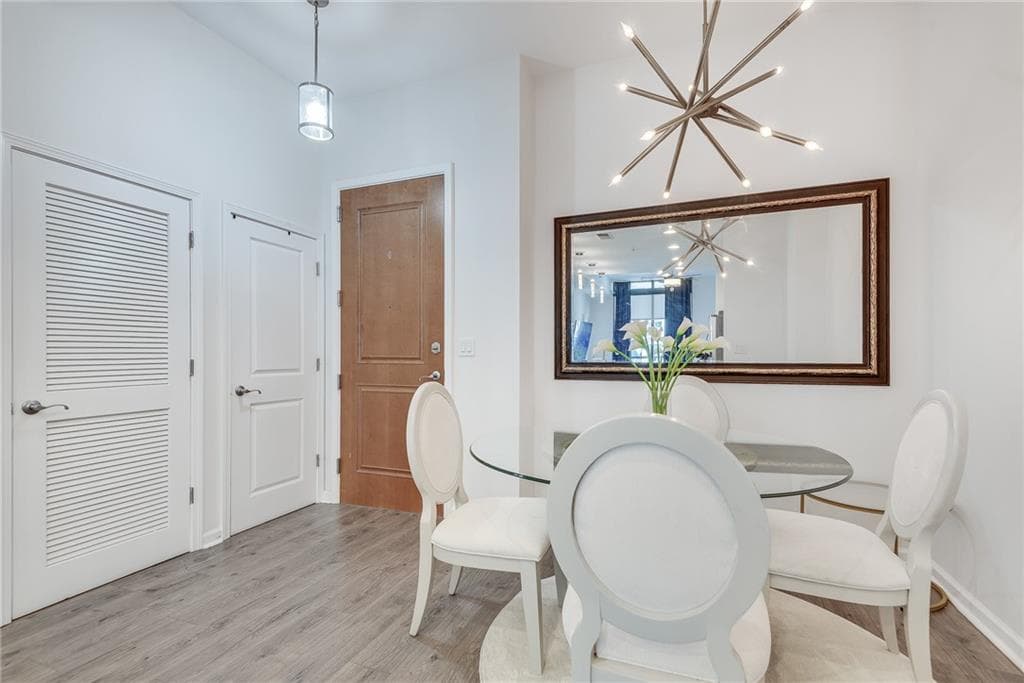 1 bedroom, 1 bathroom, 770 sq ft condominium for sale at 3040 Peachtree Road 1602, Atlanta, GA 30305 — photo 1 of 31