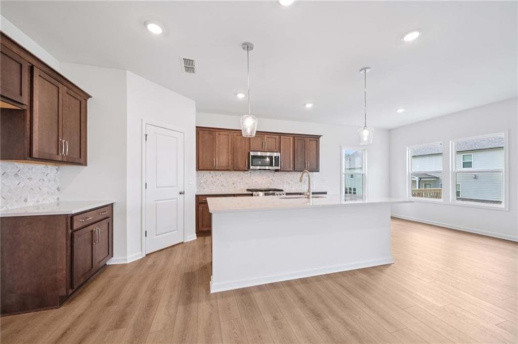 5 bedroom, 4 bathroom, 2,843 sq ft single family residence for sale at 5464 Hargrove Way, Flowery Branch, GA 30542 — photo 8