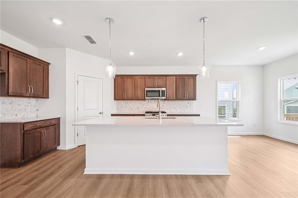 5 bedroom, 4 bathroom, 2,843 sq ft single family residence for sale at 5464 Hargrove Way, Flowery Branch, GA 30542 — photo 9