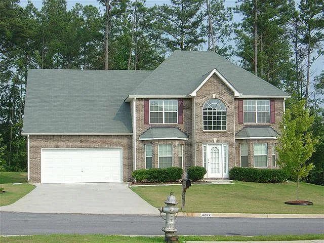 4 bedroom, 3 bathroom, 2,146 sq ft single family residence for sale at 4202 Fortune Point, Atlanta, GA 30349 — photo 1 of 43