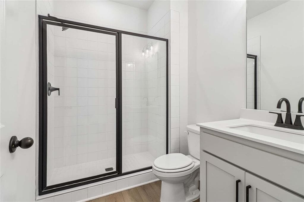 5 bedroom, 4 bathroom, 2,843 sq ft single family residence for sale at 5464 Hargrove Way, Flowery Branch, GA 30542 — photo 5