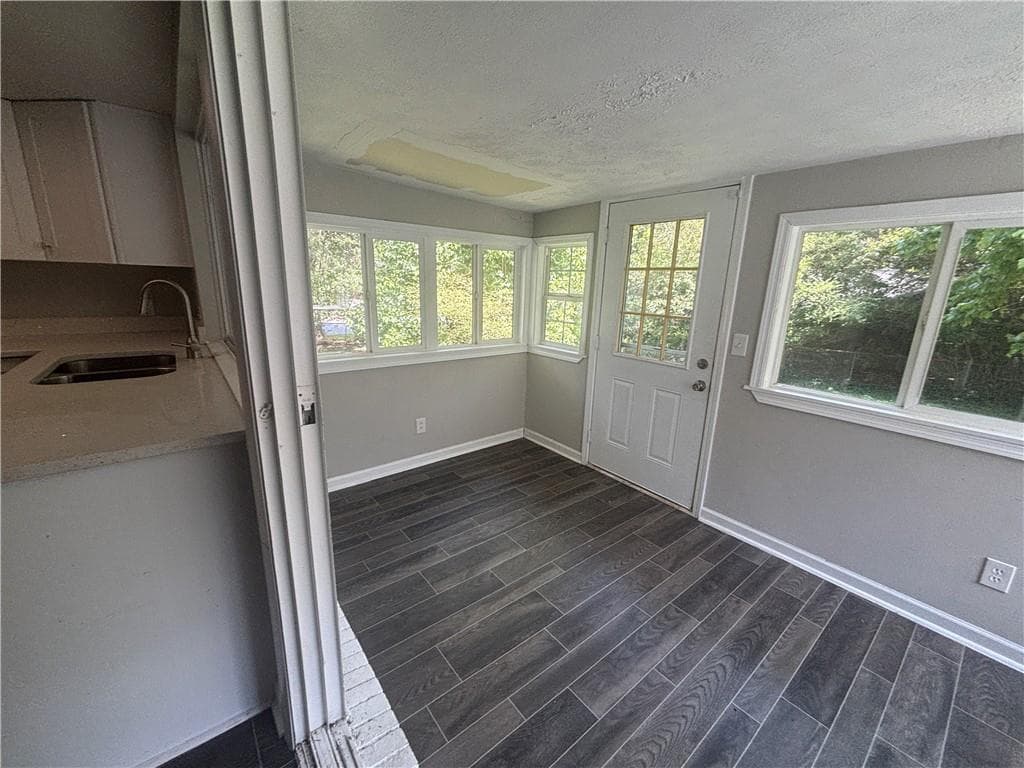 3 bedroom, 2 bathroom, 1,470 sq ft single family residence for sale at 6570 Kimberly Mill Road, Atlanta, GA 30349 — photo 4
