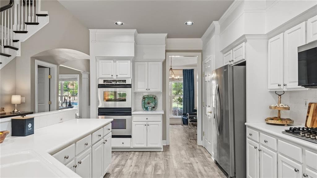 4 bedroom, 3 bathroom, 2,710 sq ft single family residence for sale at 1445 Badingham Drive, Cumming, GA 30041 — photo 6