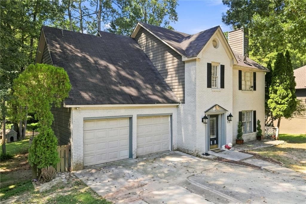 4 bedroom, 3 bathroom, 1,934 sq ft single family residence for sale at 562 Black Creek Drive, Lawrenceville, GA 30044 — photo 2