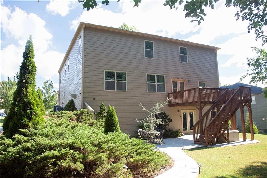 6 bedroom, 5 bathroom, 5,840 sq ft single family residence for sale at 2410 Cain Circle, Dacula, GA 30019 — photo 7