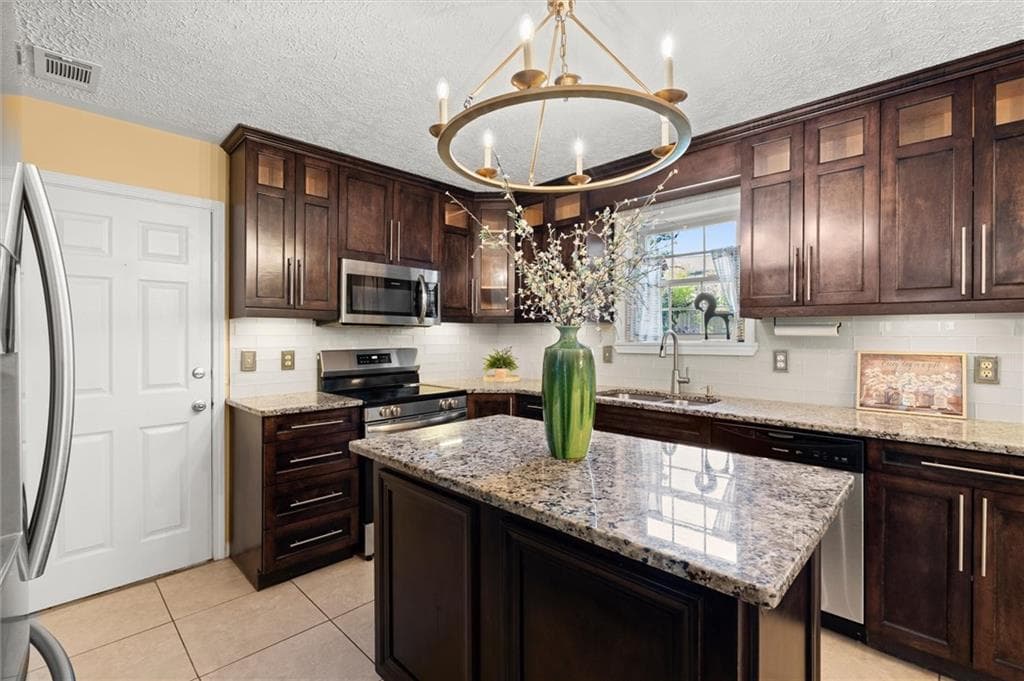 4 bedroom, 3 bathroom, 2,010 sq ft single family residence for sale at 2431 Stonebridge Lane, Duluth, GA 30096 — photo 2