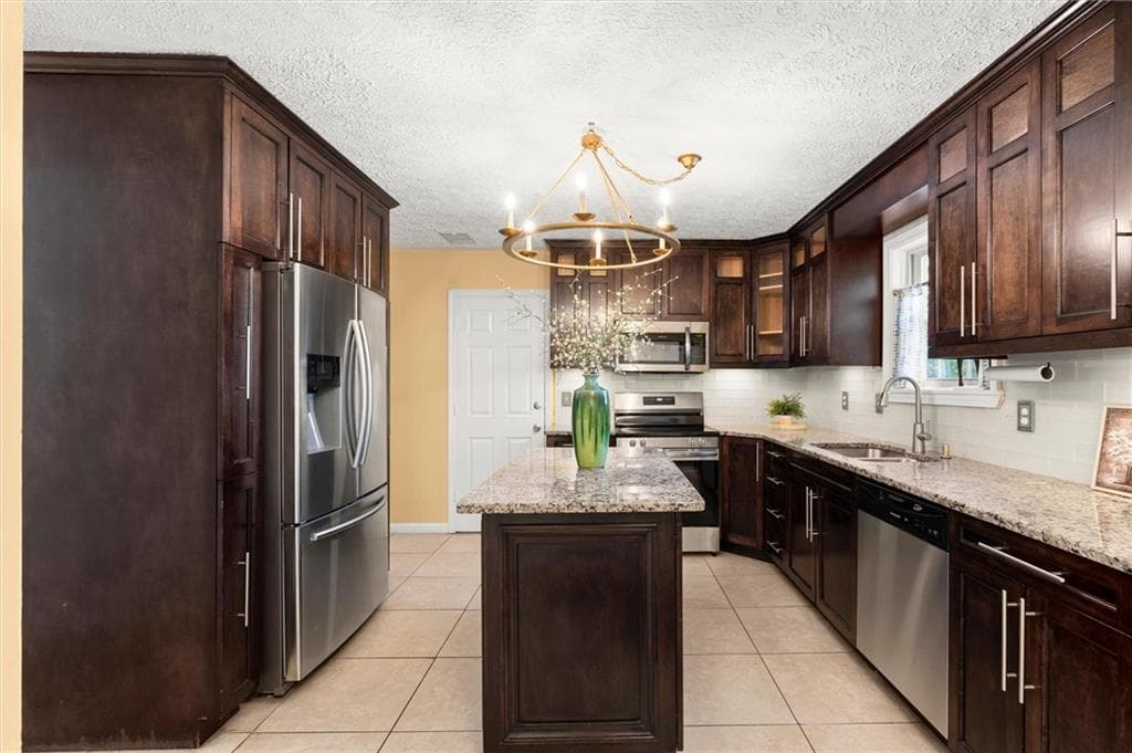 4 bedroom, 3 bathroom, 2,010 sq ft single family residence for sale at 2431 Stonebridge Lane, Duluth, GA 30096 — photo 6