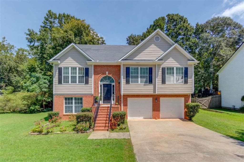 4 bedroom, 3 bathroom, 2,151 sq ft single family residence for sale at 1143 Augustine Drive, Auburn, GA 30011 — photo 1 of 45