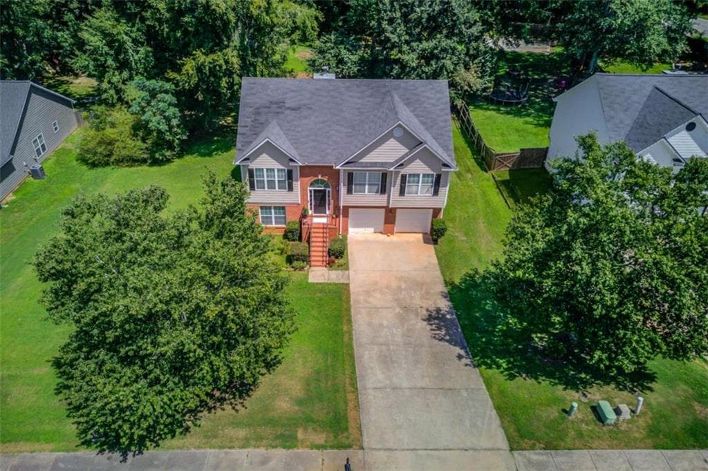 4 bedroom, 3 bathroom, 2,151 sq ft single family residence for sale at 1143 Augustine Drive, Auburn, GA 30011 — photo 2