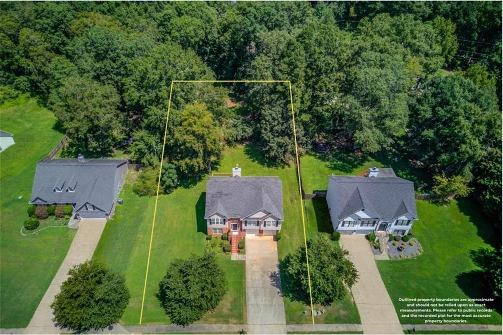 4 bedroom, 3 bathroom, 2,151 sq ft single family residence for sale at 1143 Augustine Drive, Auburn, GA 30011 — photo 3