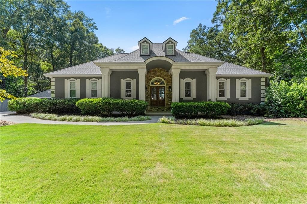 6 bedroom, 5 bathroom, 4,604 sq ft single family residence for sale at 5725 Ash Drive, Cumming, GA 30040 — photo 1 of 98