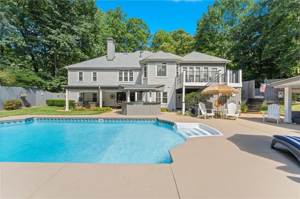 6 bedroom, 5 bathroom, 4,604 sq ft single family residence for sale at 5725 Ash Drive, Cumming, GA 30040 — photo 2