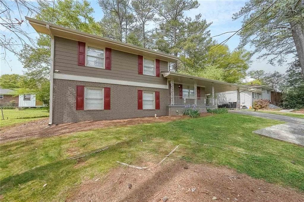 4 bedroom, 3 bathroom, 1,994 sq ft single family residence for sale at 2757 Cavalier Drive, Decatur, GA 30034 — photo 2