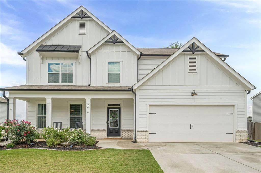 5 bedroom, 3 bathroom, 3,124 sq ft single family residence for sale at 7410 Rambling Vale, Cumming, GA 30028 — photo 1 of 56