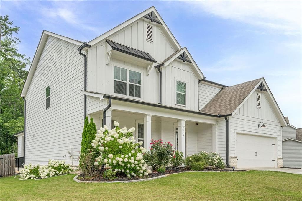 5 bedroom, 3 bathroom, 3,124 sq ft single family residence for sale at 7410 Rambling Vale, Cumming, GA 30028 — photo 2
