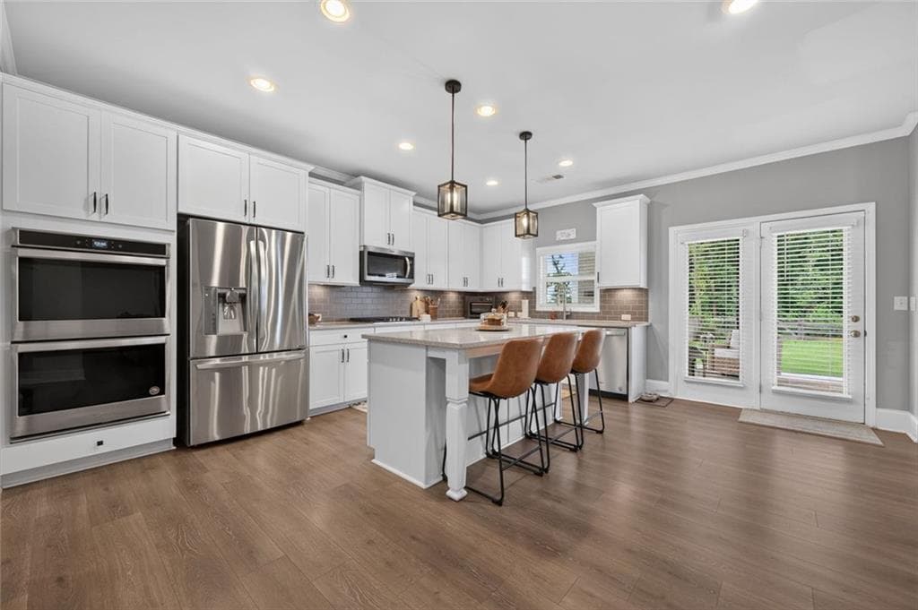5 bedroom, 3 bathroom, 3,124 sq ft single family residence for sale at 7410 Rambling Vale, Cumming, GA 30028 — photo 7