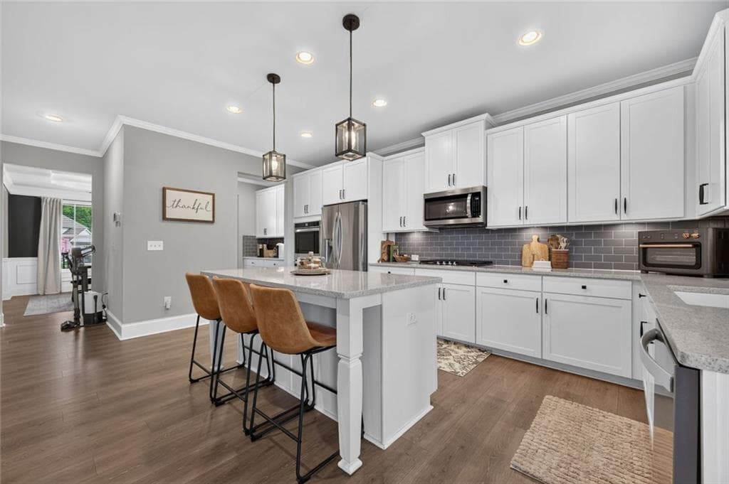 5 bedroom, 3 bathroom, 3,124 sq ft single family residence for sale at 7410 Rambling Vale, Cumming, GA 30028 — photo 8