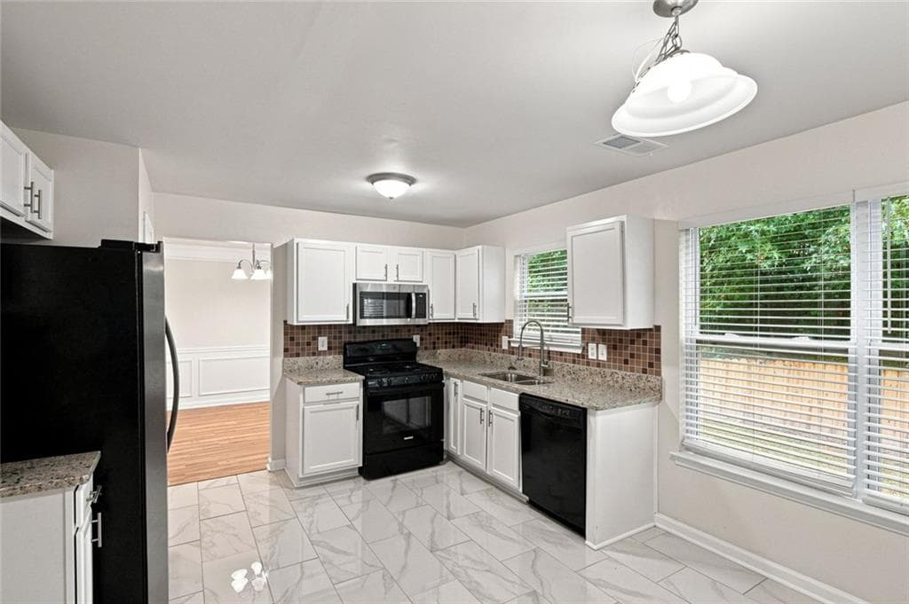 4 bedroom, 3 bathroom single family residence under contract at 5073 Laythan Jace Court Court, Snellville, GA 30039 — photo 10