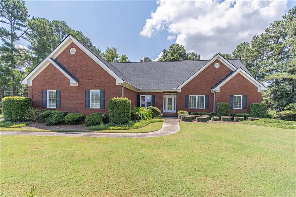4 bedroom, 2 bathroom, 2,513 sq ft single family residence for sale at 3562 Thompson Mill Road, Buford, GA 30519