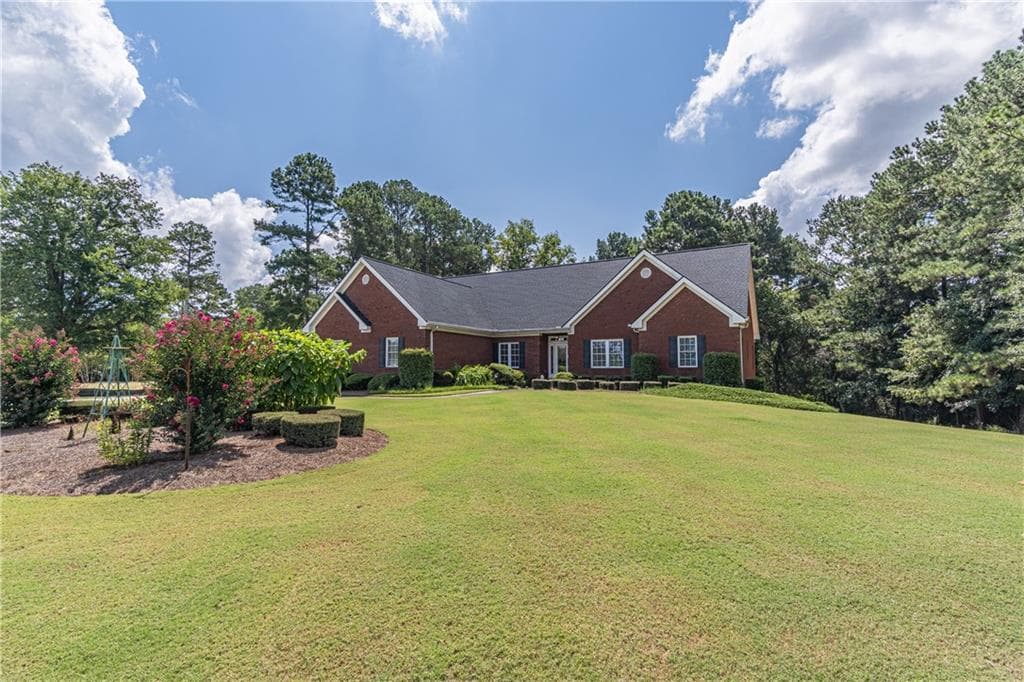 4 bedroom, 2 bathroom, 2,513 sq ft single family residence for sale at 3562 Thompson Mill Road, Buford, GA 30519 — photo 2