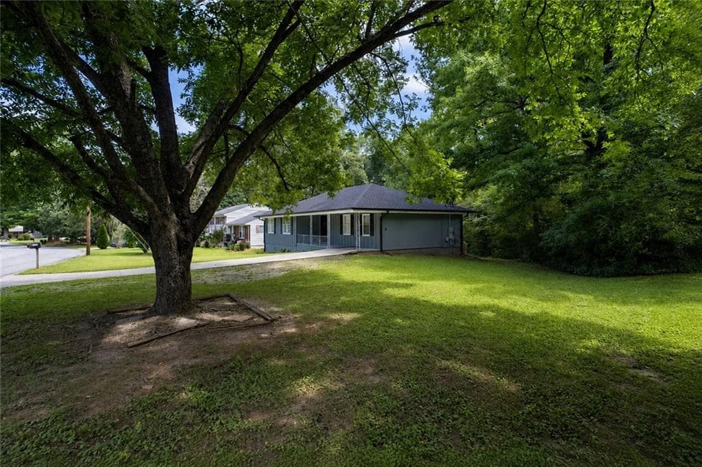 3 bedroom, 2 bathroom, 1,257 sq ft single family residence for sale at 7102 Doncaster Road, Jonesboro, GA 30236 — photo 3