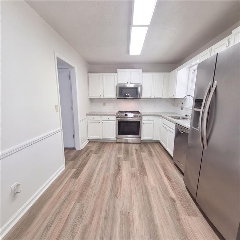 3 bedroom, 3 bathroom, 1,968 sq ft single family residence for sale at 2681 Tybee Drive, Buford, GA 30519 — photo 2