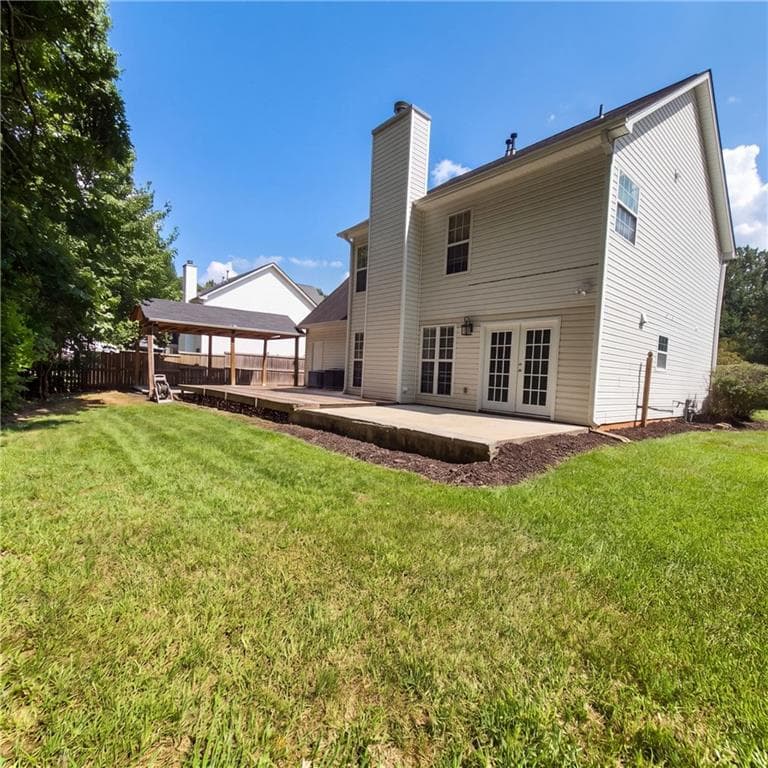 4 bedroom, 3 bathroom, 1,834 sq ft single family residence for sale at 709 Sunny Field Lane, Lawrenceville, GA 30043 — photo 5