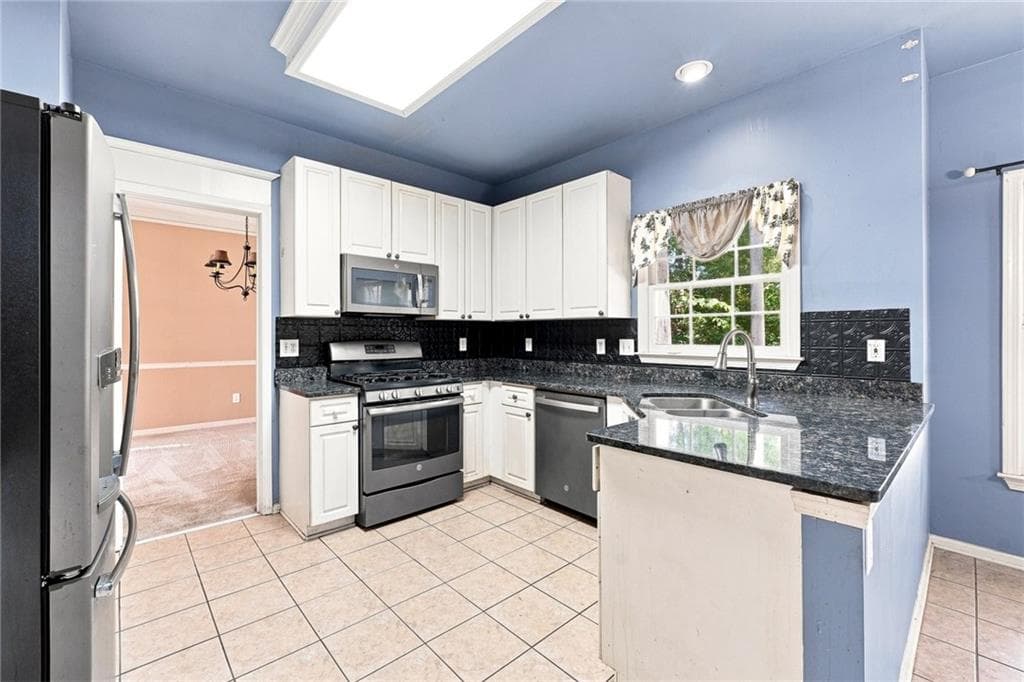 5 bedroom, 4 bathroom, 3,287 sq ft single family residence for sale at 1039 Mount Water Lane, Lawrenceville, GA 30043 — photo 10