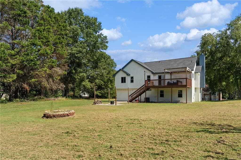 4 bedroom, 3 bathroom, 2,014 sq ft single family residence for sale at 4650 Wheeler Creek Dr, Hoschton, GA 30548 — photo 4