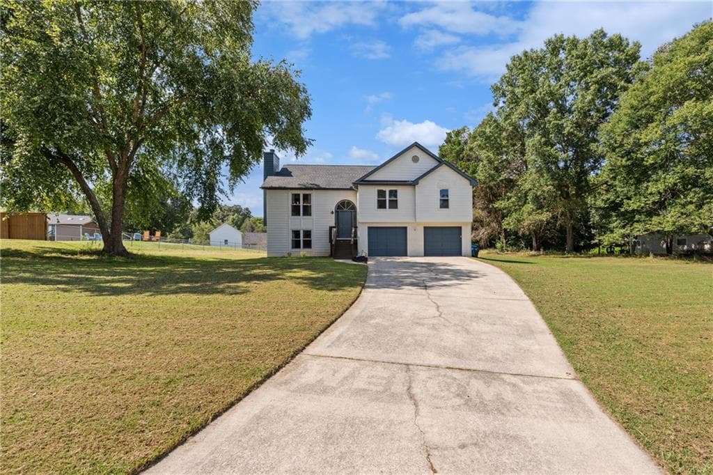 4 bedroom, 3 bathroom, 2,014 sq ft single family residence for sale at 4650 Wheeler Creek Dr, Hoschton, GA 30548 — photo 5