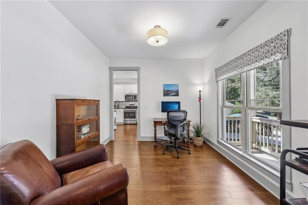 3 bedroom, 2 bathroom, 2,306 sq ft single family residence for sale at 7220 Serenity Place, Cumming, GA 30041 — photo 5