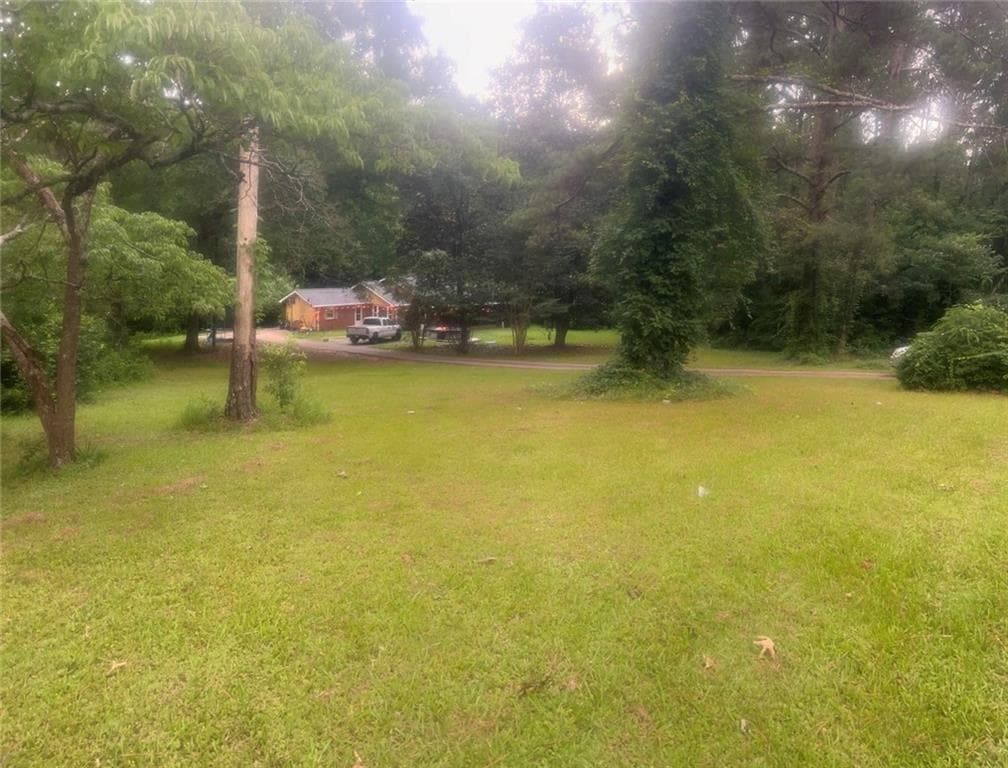 5 bedroom, 2 bathroom, 1,480 sq ft single family residence for sale at 3324 Miller Road, Lithonia, GA 30038 — photo 2
