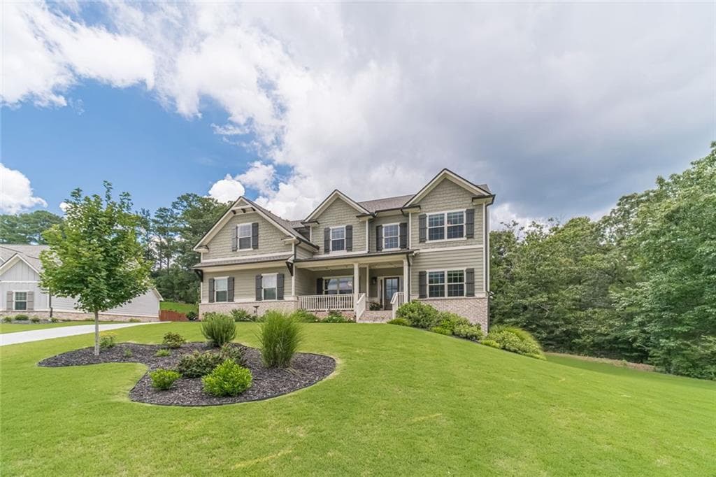 4 bedroom, 3 bathroom, 3,111 sq ft single family residence for sale at 1448 Henderson Ridge Lane, Loganville, GA 30052 — photo 2